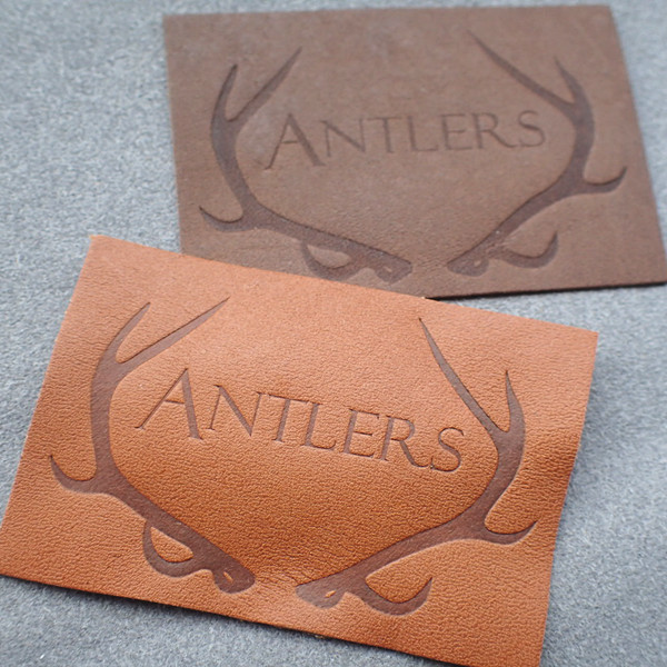 Customized Hot Stamped Antique Copper Embossed Leather Patches for sale