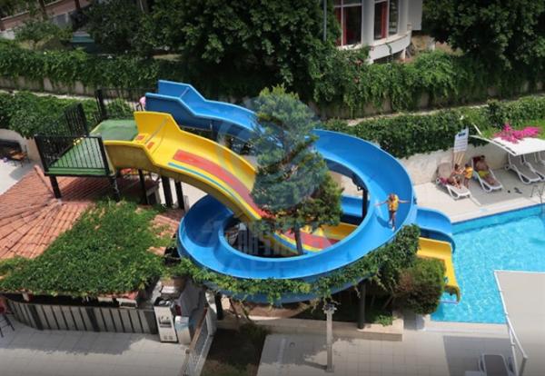 Cheap OEM Swimming Pool Water Slide Fade Resistant Fiberglass Spray Ground Pool Slide for sale
