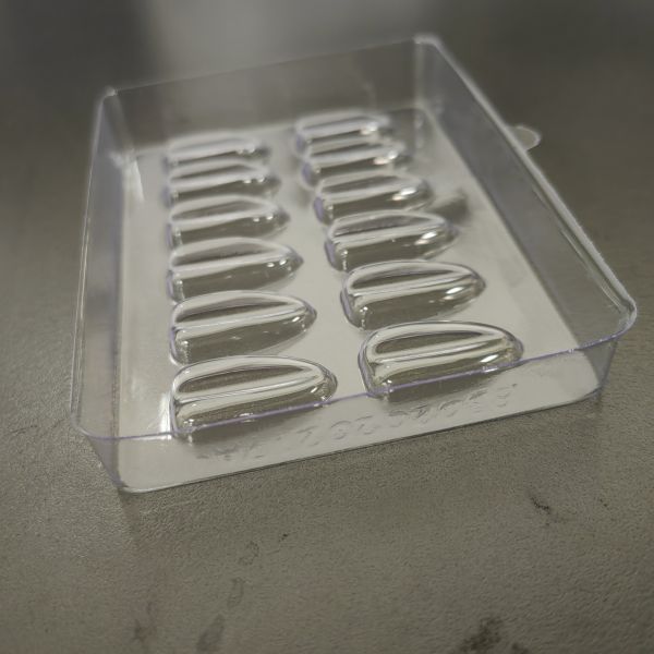 Customized melon seed shaped 12 grid PET transparent vacuum formed Nail Tip storage display tray