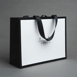 China Luxury Custom Paper Packaging Shopping Bag With Logo on sale