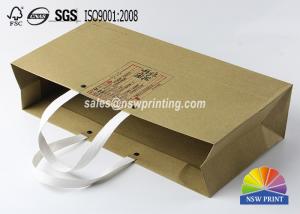 China Kraft Custom Paper Shopping Bags , Plastic Handle Eyelet Brown Craft Tea Gift Bags on sale