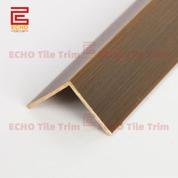 Close-up view of brass corner trim profile and surface texture