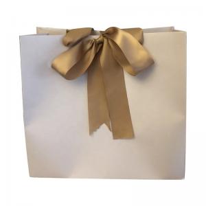 China Customized Color 100g Craft Shopping Paper Bag With Ribbon Handle on sale
