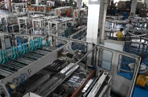 Multiple paper roll wrapping machine toilet tissue making machine
