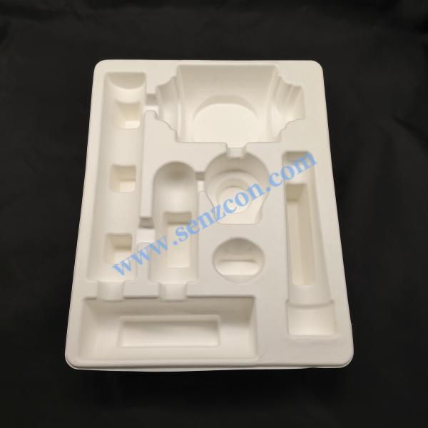 OEM eco-friendly white pulp molded packaging base for hardware accessories made from bagasse.It is a high-quality product produced by wet pressing,