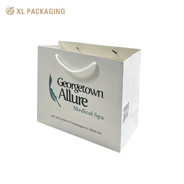 Cheap XL Packaging Custom Company Logo Paper Shopping Bags High Quality Coated Paper Hand Bags For Clothes Shoes Retail Packaging Sturdy Handles Gloss Matt Lamination & Bulk Order Discounts for sale