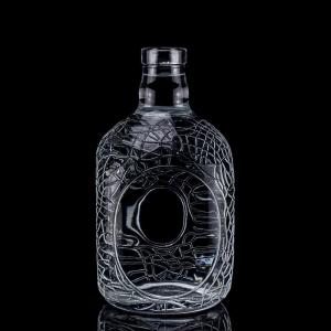 China Glass Round Carved 700ml 750ml Vodka Glass Bottle Wine Bottle With Cork Sealing Type on sale