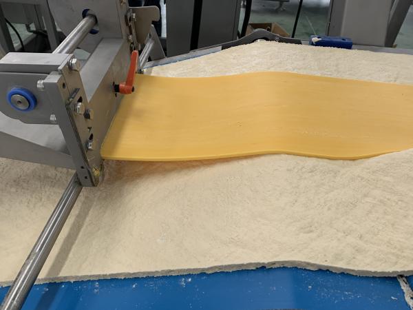 Cheap 600-1200kg/H Capacity Puff Pastry Production Line Of Semi-Automatic / Fully Automatic For Stuffed Or Empty Pastries for sale
