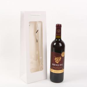 China Glossy Luxury Design kraft paper wine gift bags For Mother'S Day on sale