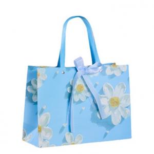 Best Fresh White Chrysanthemum Pattern Sky Blue Cardboard Gift Bags With Ribbon Fashion Tote Bag wholesale